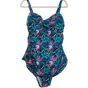 BEACH PARTY. Tropical floral one piece skirted bathing suit.